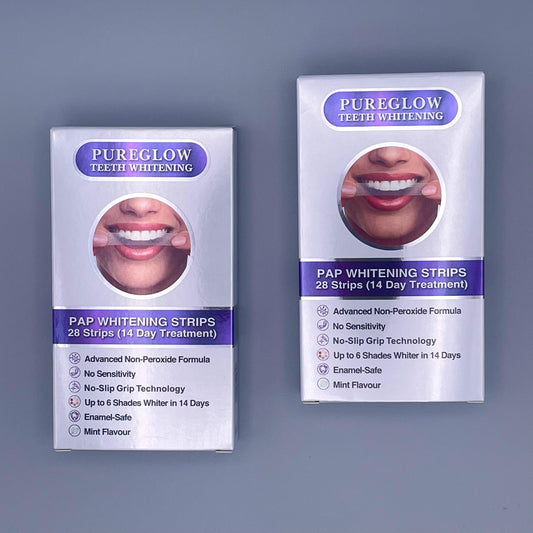 Two front-facing PureGlow PAP Whitening Strips boxes side by side, showing advanced peroxide-free formula and 14-day treatment benefits including zero sensitivity, no-slip grip, and enamel-safe whitening.