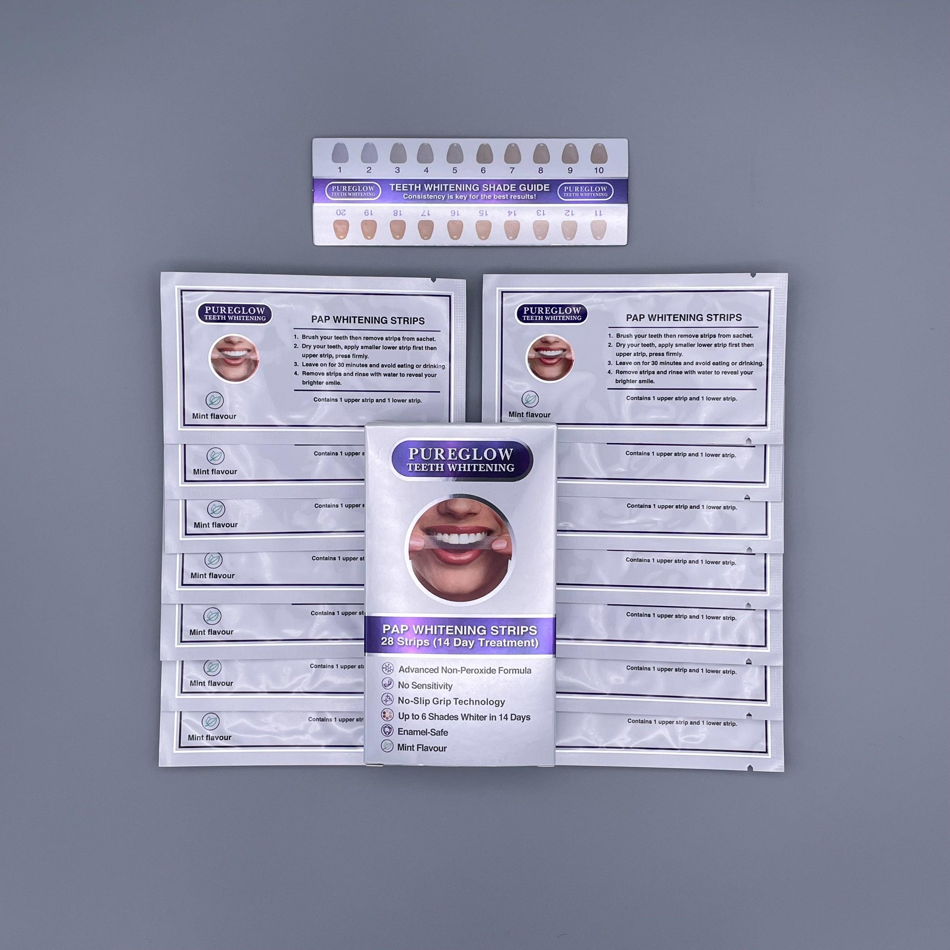 Full PureGlow Teeth Whitening Strips kit showing open box, individual strip sachets, shade guide, and instruction leaflet. Designed for peroxide-free, enamel-safe whitening with visible results.